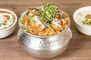 Veg Biryani [with Gravy and Raita]