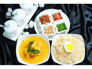 Prawns Burmese Khow Suey With Burnt Garlic Rice