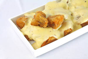 Mushroom Fritters In Mustard Sauce