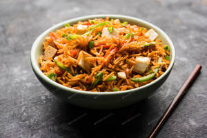 Veg Schezwan Fried Rice + 250 Ml Thumsup