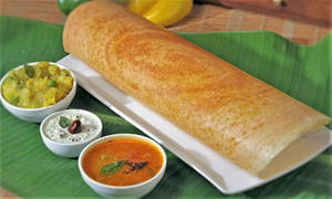 Garlic Roast Dosaa (Served with Cocunut Chutney, Red Chutney and sambar)