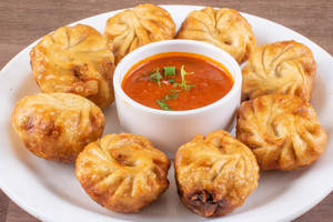 Steamed chicken  momos [6 pcs]