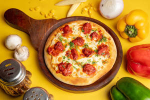 10" Medium Butter Chicken Pizza + Thums Up