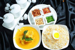 Prawns Burmese Khow Suey With Burnt Garlic Rice