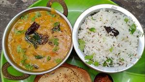 Dal Tadka + Jeera Rice + Tawa Butter Roti (4 Pcs) + Salad + Raita + Pickle