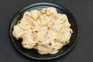 Veg Afghani Malai Momos  ( 10 Pcs )