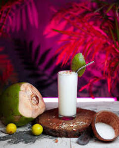Tender Coconut Juice [400ml].  [ Small amount of pineapple,ginger and lemon]       with ice