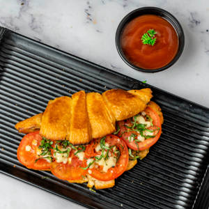 Tomato, Basil & Mozzarella Cheese Sandwich In Croissant Bread - Veg