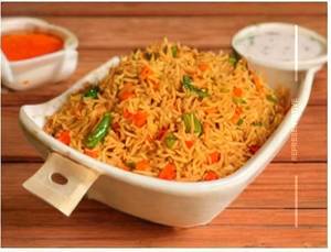 Veg Schezwan Rice .