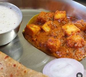 Thali Paneer Masala With 2 Salty paratha Butter