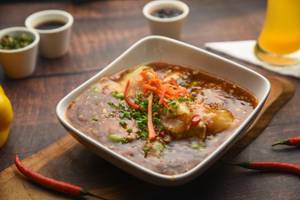 Sliced & Steamed Bhetki Fish With Chilli Oyester
