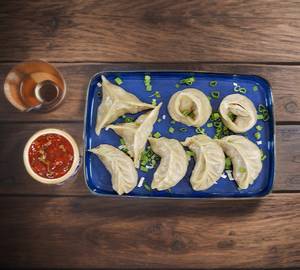 Veg steamed momos [8 pieces]