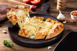 Exotic Veg Cheese Garlic Bread   