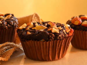 Whole Wheat Gooey Choco Roasted  Almond Zucchini Muffins
