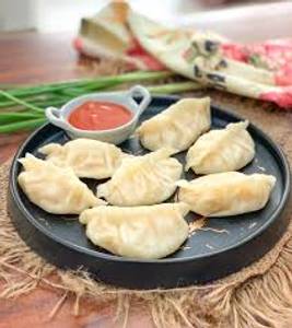 Chicken Steamed Momos [7 Pieces]