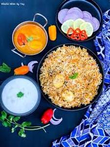 Egg Biryani with Vegetable Raita