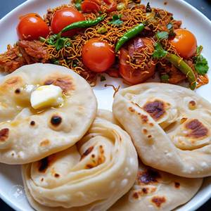 1 Sev Tamatar + 4 Tawa Roti                                                                                                 