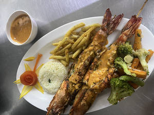 Grilled Lobster With Vegetables And Fries
