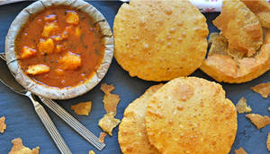 Bedami Poori, Aloo Tamatar Sabzi And Raita