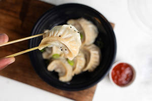 Juicy Steamed Veg Exotic Momos [8 Pcs]