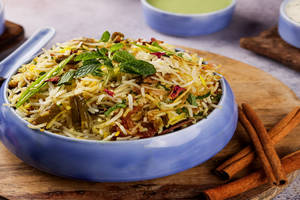 Veg. Biryani (served With Raita)