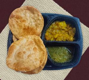 4 poori + veg + chutney + salad