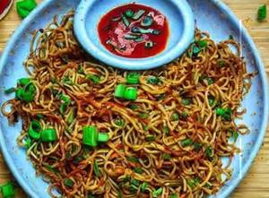 Schezwan Gobi Fried Noodles