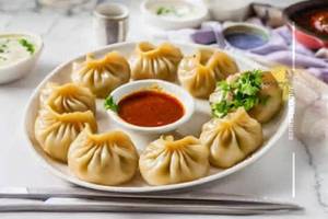 Paneer momos [gravy]                                                    