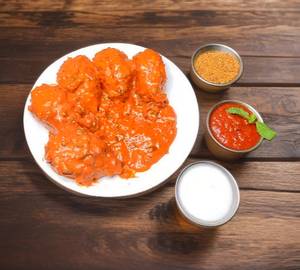 Paneer Chilli Gravy Momos