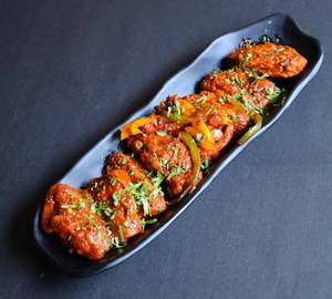 Chicken Wings Tossed With Chilli Garlic Sauce