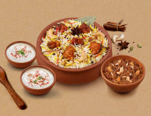 1 KG Bhuna Chicken Matka Biryani + FREE Dessert