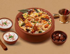 1 KG Veg & Paneer Overload Matka Biryani + FREE...