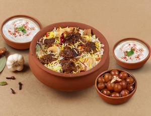1 KG Gosht Mutton Matka Biryani + FREE Dessert