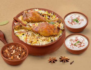1 KG Tangdi Chicken Matka Biryani + FREE Dessert