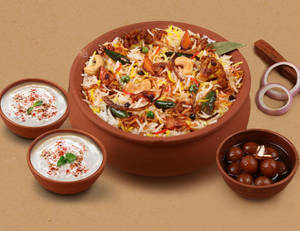 1 KG Veg Nawabi Matka Biryani + FREE Dessert