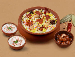 1 KG Chicken Tikka Matka Biryani + FREE Dessert