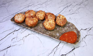 Veg Fried Momos [7 Pieces]