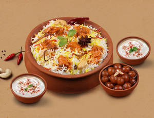 1 KG Butter Chicken Matka Biryani + FREE Dessert