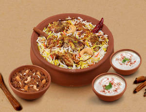1 KG Original Chicken Matka Biryani + FREE Dessert