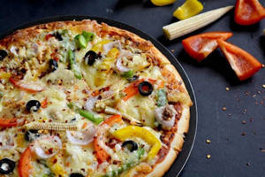 Cheesy Baby Corn Pizza