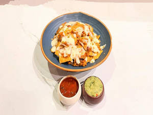 Nachos Dressed With Cheese Sauce