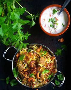 Murgh Biryani +raita+salad+coke