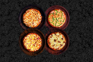 4 Small Veg Single Pizzas @ Rs. 104.75 Each