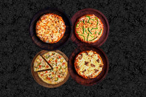 4 Small Veg Double Pizzas @ Rs. 117 Each