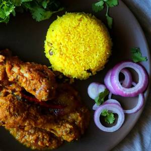 Basanti polao with chicken kosha and chutney