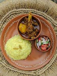 Basanti polao with mutton kosha and chutney