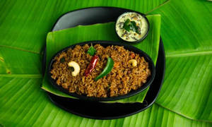 Melukote Puliyogre (asp)