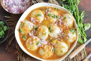 14 Mini Idli With Ghee Dipped In Samber