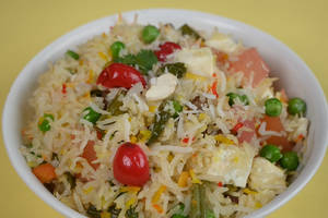 Veg Biryani (Served with raita.)