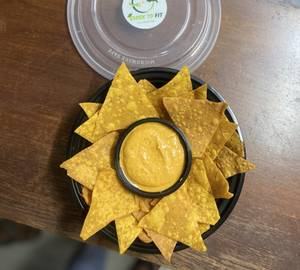 Nachos With Red Pepper Hummus Dip
